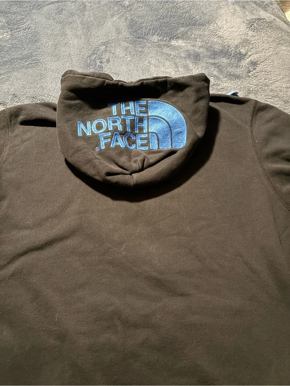 The North Face Black Hoodie with Light Blue Trim